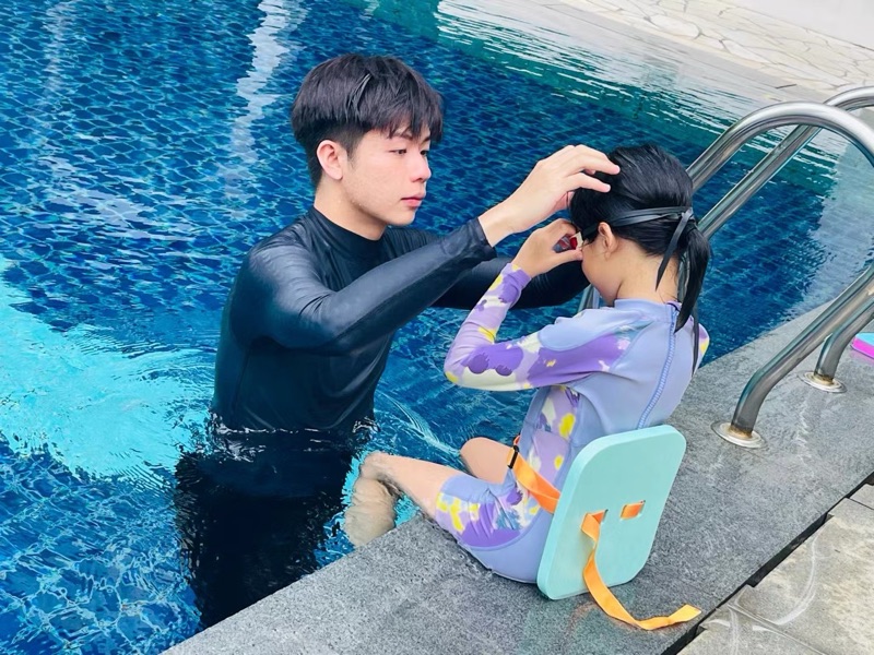 Swimming lesson with instructor